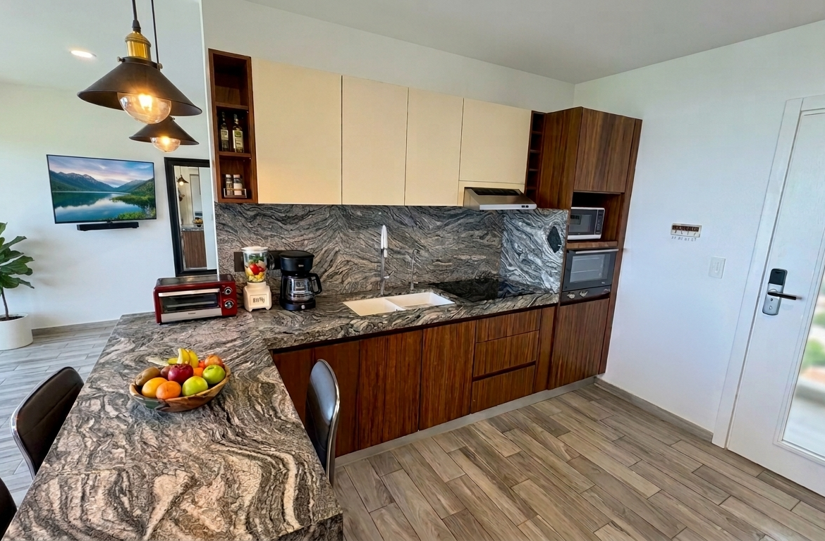 Cocina amplia y moderna en departamento en venta en torre adamant merida