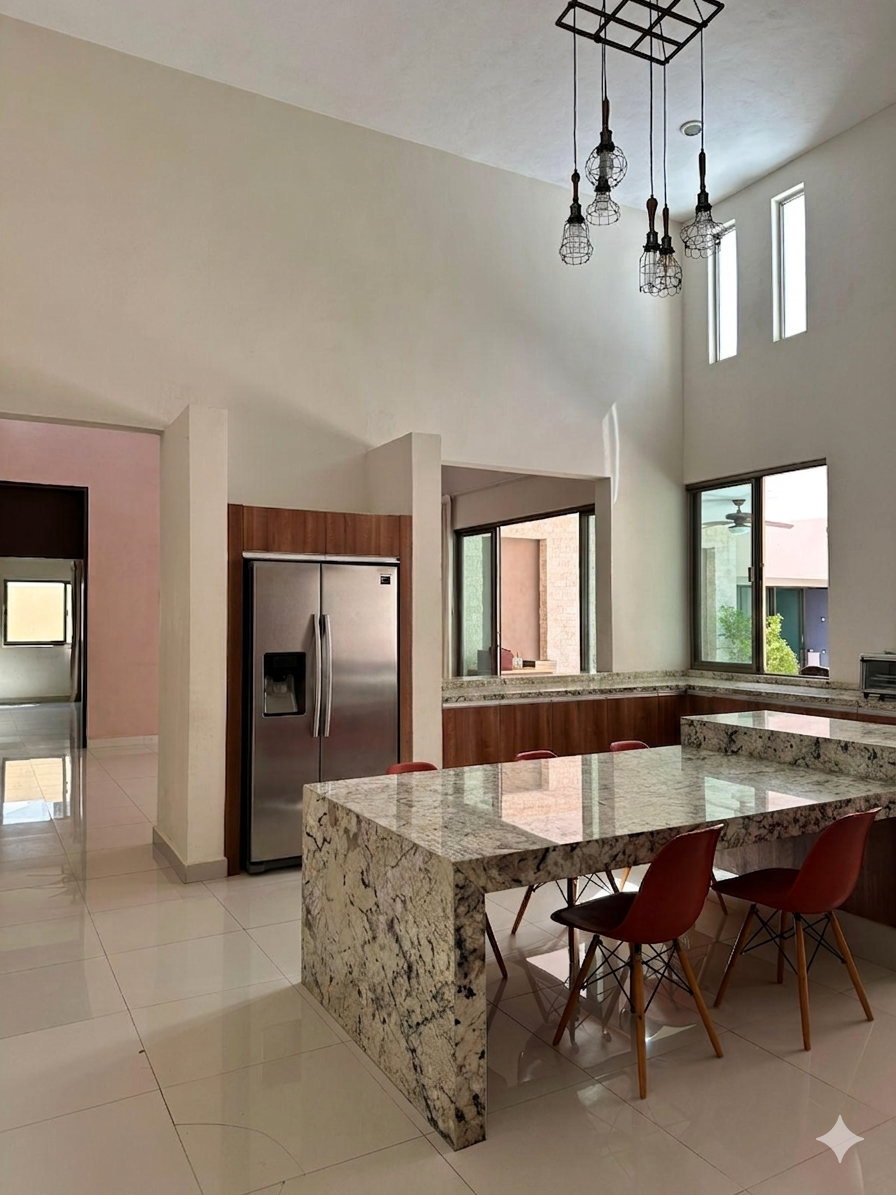 cocina moderna con encima de granito equipada en casa en venta de una planta merida
